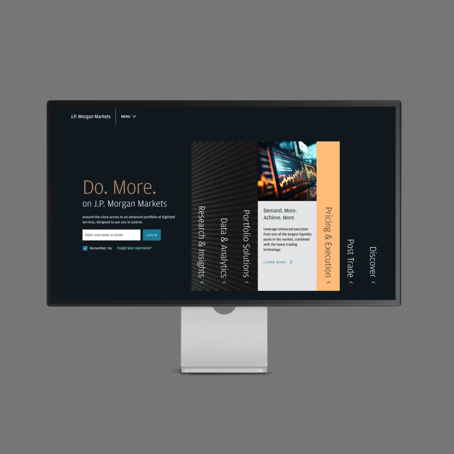 Desktop monitor displaying the J.P. Morgan Markets platform with navigation sections for research, analytics, portfolio solutions, and pricing & execution.