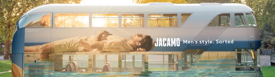 Jacamo menswear advertising campaign displayed across the side of a double-decker bus